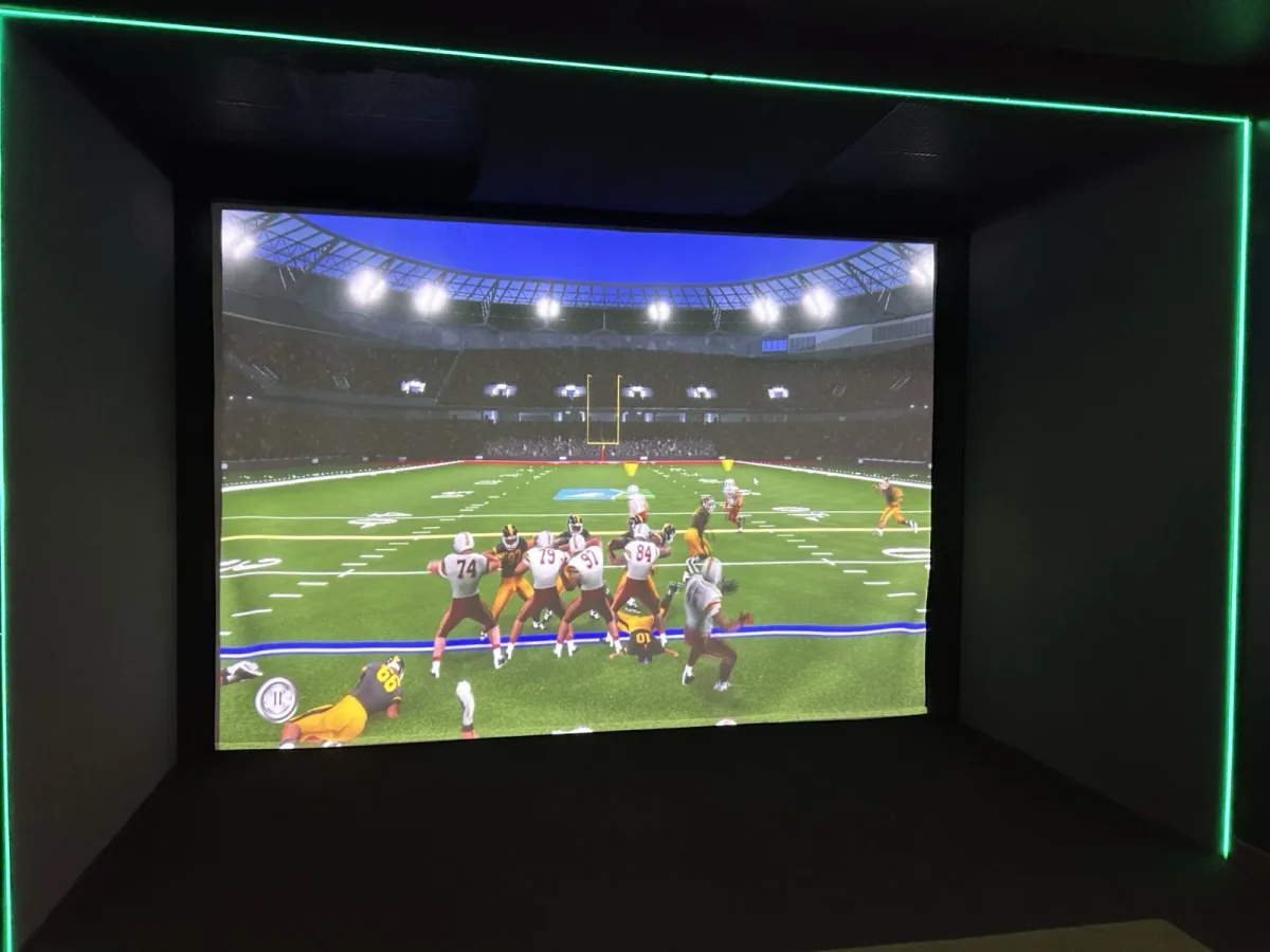 Impact screen - white being used with a football simulator